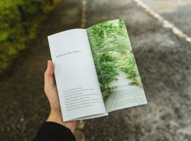 person holding book