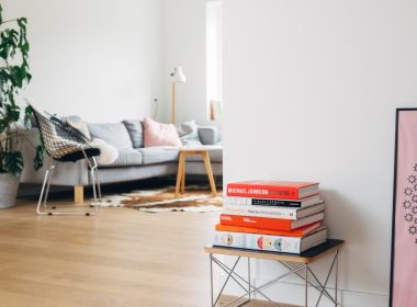 books on brown wooden stool